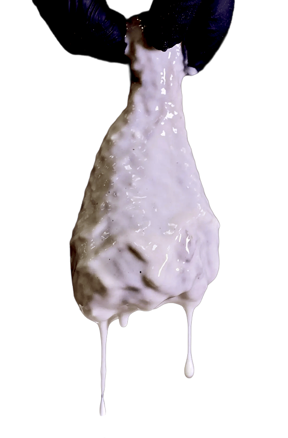 Fresh batter dripping from a drumstick