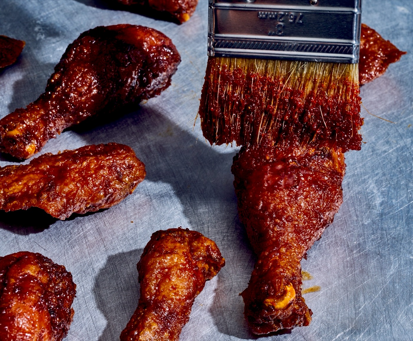 Sauce brushed onto a drumstick